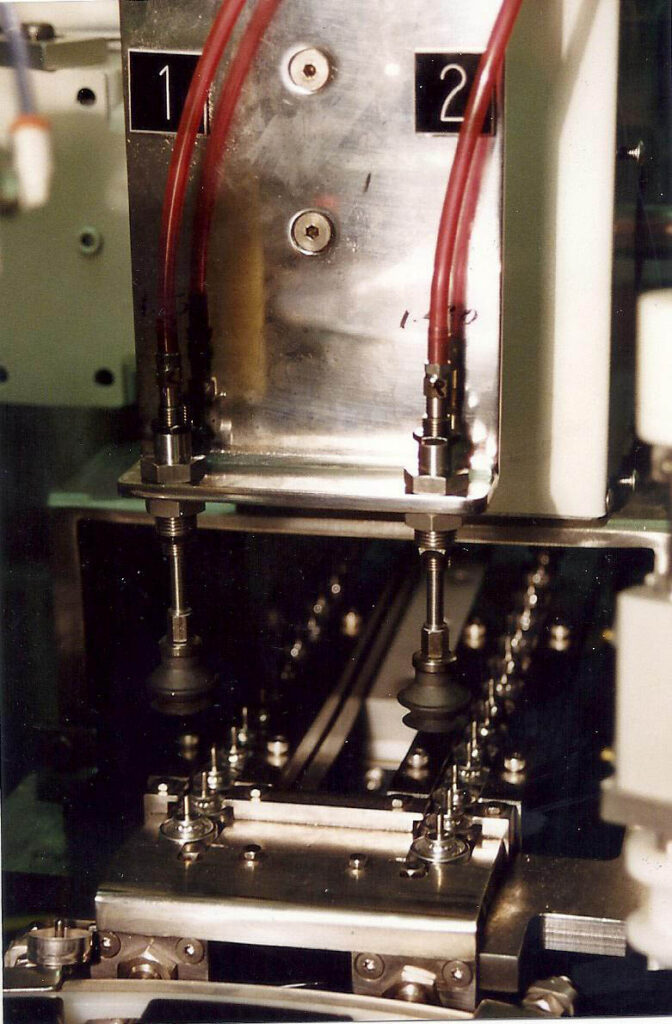 Automated Aerosol Cap Placement Machine